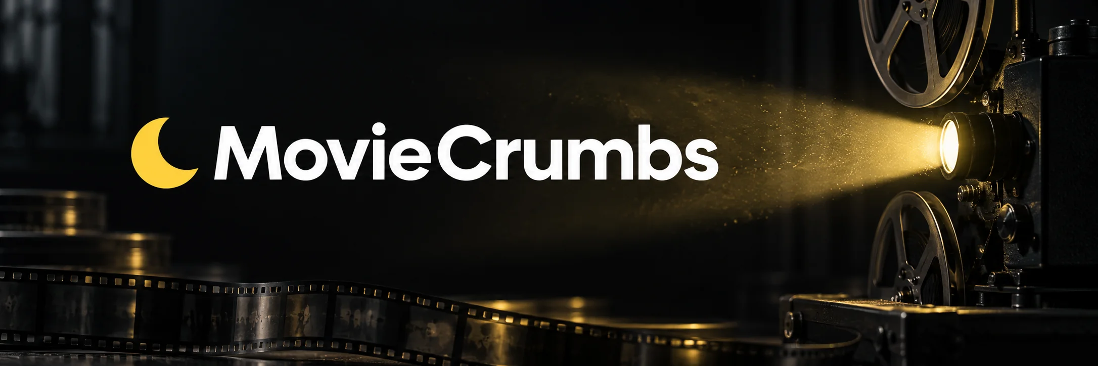MovieCrumbs in white with a yellow crescent beside a glowing cinema projector